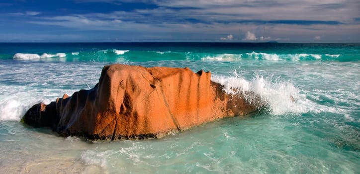 on a deserted beach on Grand Soeur,Seychelles