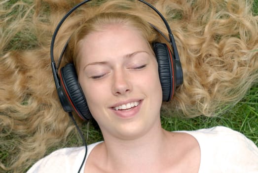 Young woman enjoying music