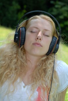 Young woman enjoying music