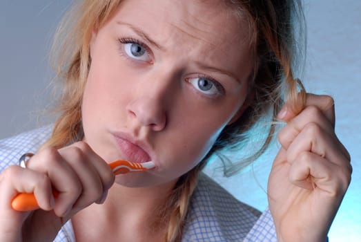 Woman brushing her teeth