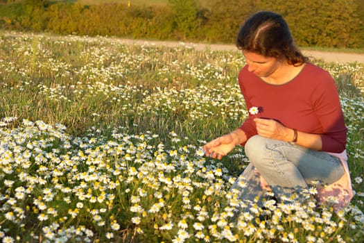 Woman with daisies
