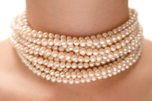 Wearing a pearl necklace