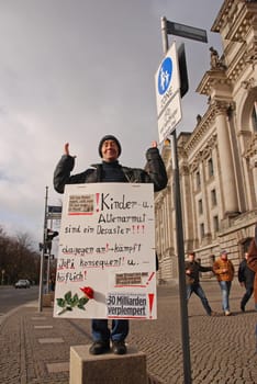 The lone demonstrator in front of the Reichstag building.