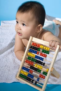 Baby with calculating machine