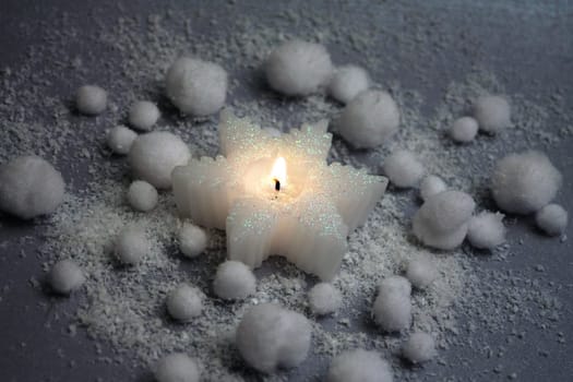 Candle in the snow