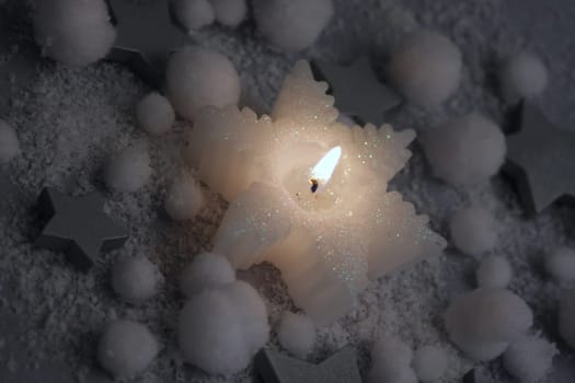 Candle in the snow