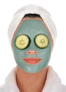 Woman with cucumber mask