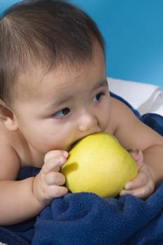 Baby with apple