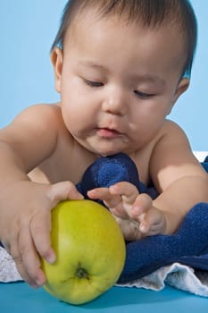Baby with apple