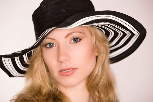 Portrait of a woman with hat