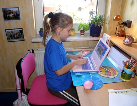 Lisa practicing on the children's computer