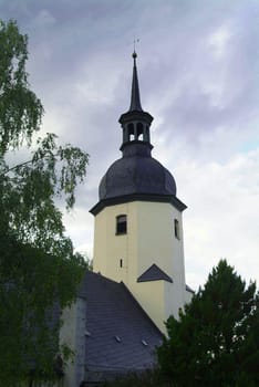 Rain clouds over the church tower