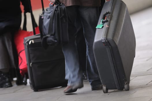 People travel with suitcases