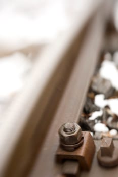 Screw on the track