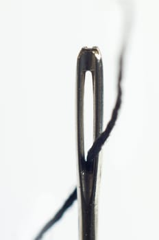 Eye of the needle with thread