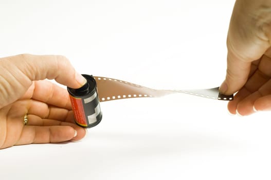 Hand Holding Film Roll
