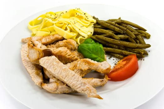 Sliced pork with pasta and