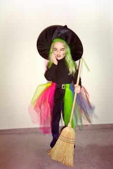 Little witch with broom