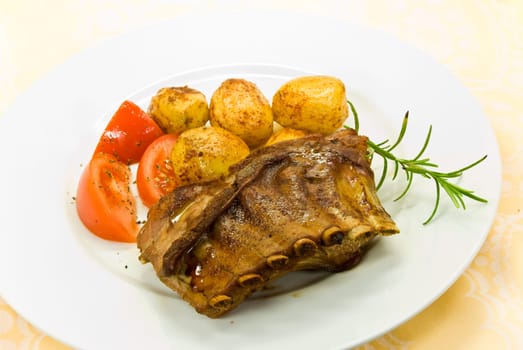 Roasted suckling pig with fried potatoes