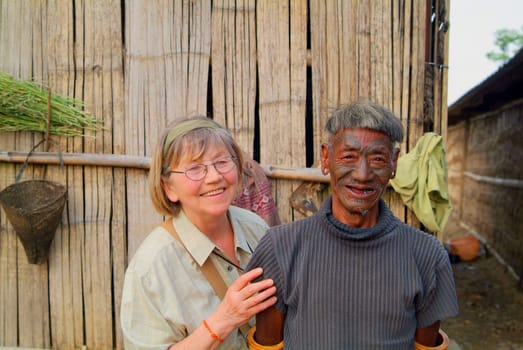 Hanna (75 years old) during her first encounter with a relative of the last headhunters in Nagaland in northeast India.