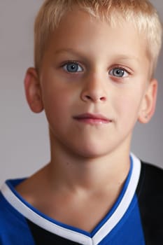 Boy in soccer jersey