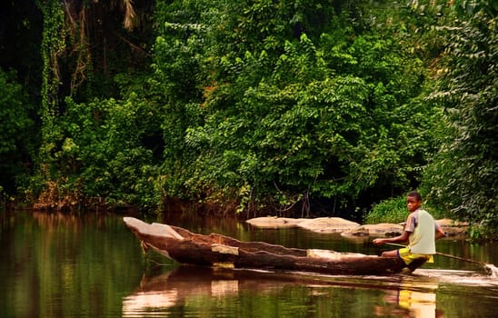 The Lobé,the stream that plunges into the sea as a waterfall further down,is one of the main traffic arteries in the jungle of southern Cameroon. 200 km up the river,you see nothing but some pygmy villages.