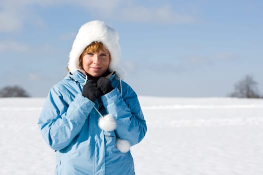 Cute woman in the snow
