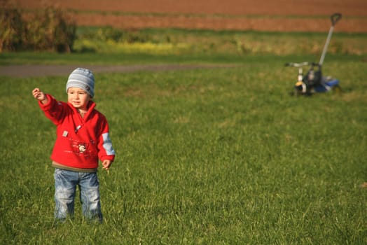 Child with tricycle