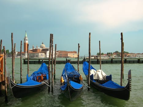 Three gondolas in Venice