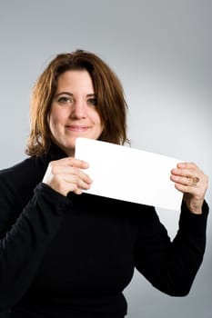 Woman showing blank card