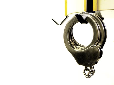 Handcuff on coat hook