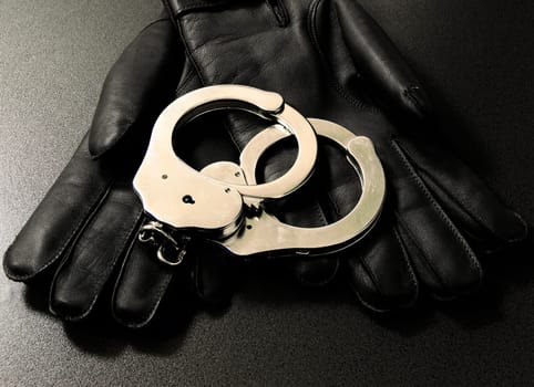 Handcuffs on gloves