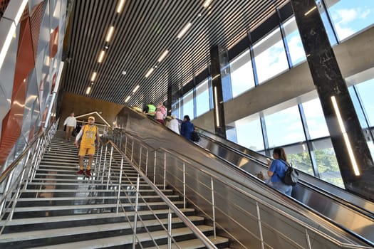 Moscow, Russia - Aug 21. 2023. Escalator and stairs at the Zelenograd-Kryukovo station D3 of the surface metro diameter