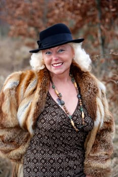 white-haired woman late 50's