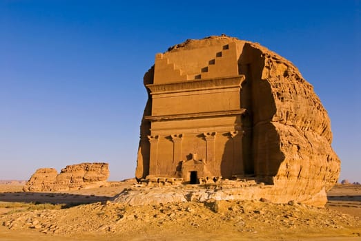 Nabataean tomb in Medain Saleh,Saudi Arabia. Almost a copy of the more famous site of "Petra"" in Jordan,only without a single tourist,abandoned in the middle of a desert. The Nabataeans controlled the trade route of the ""Frankincense Road"""