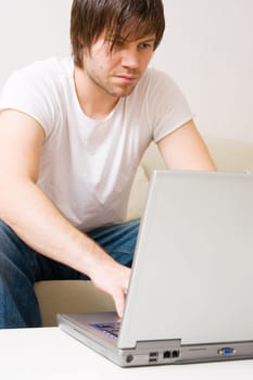 young businessman doing work at home