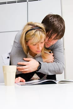 couple reading magazine