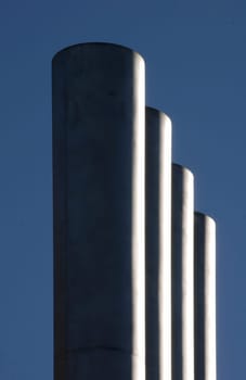 Exhaust pipes in the evening sun
