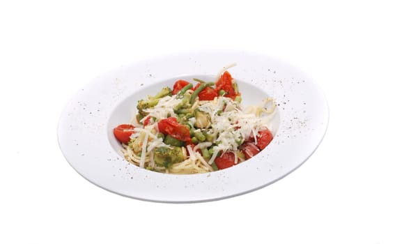 Plate of spaghetti,vegetables and parmesan cheese