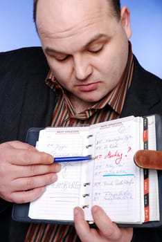 Man with appointment planner