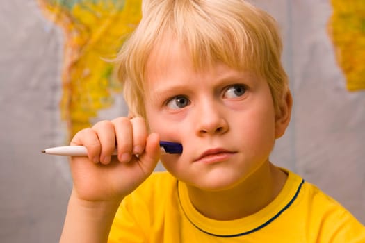 young boy thinking