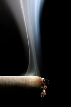 cigarette smoking isolated on black