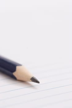 pencil on notebook