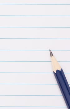 pencil on notebook