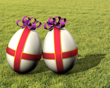 Two wrapped easter eggs in the grass