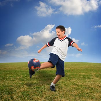 kid playing soccer outside