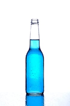 bottle with blue liquid on white