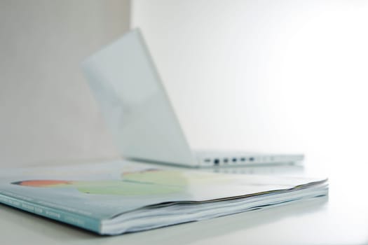 Laptop with magazine