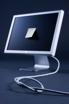 Monitor with note and cable