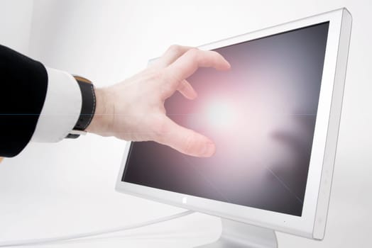 Hand Reaches for Monitor